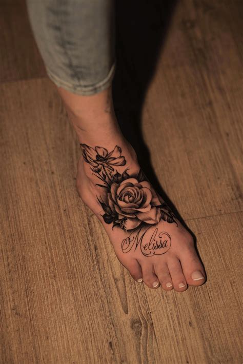 floral tattoo foot|cute foot tattoos for females.